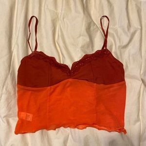 Orange lace and mesh crop tank top